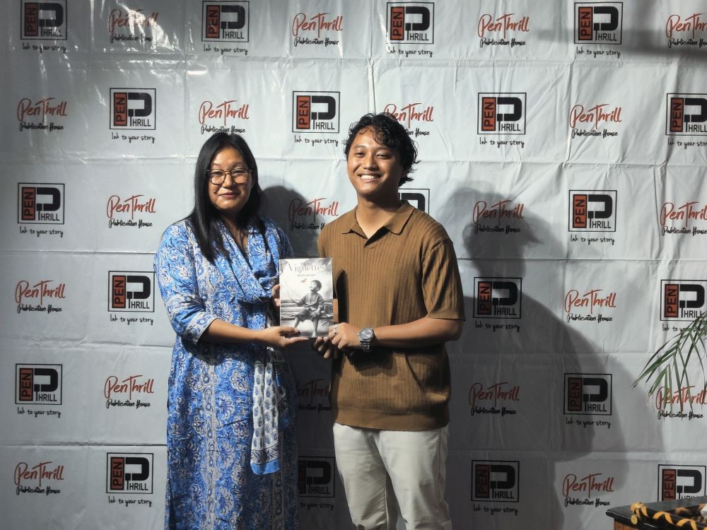 The author Mechi Imchen with special guest Dr Lanurenla, Principal of Sao Chang College, Tuensang during the book launch held at Aroma Indian Thali, Mokokchung on October 7. (Morung Photo)